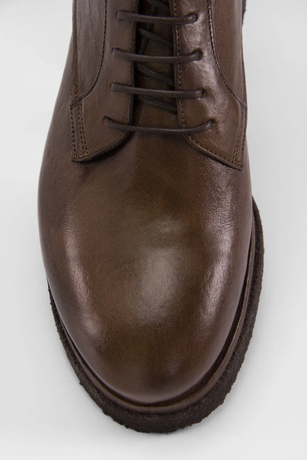 BROMPTON muddy-brown ankle boots.